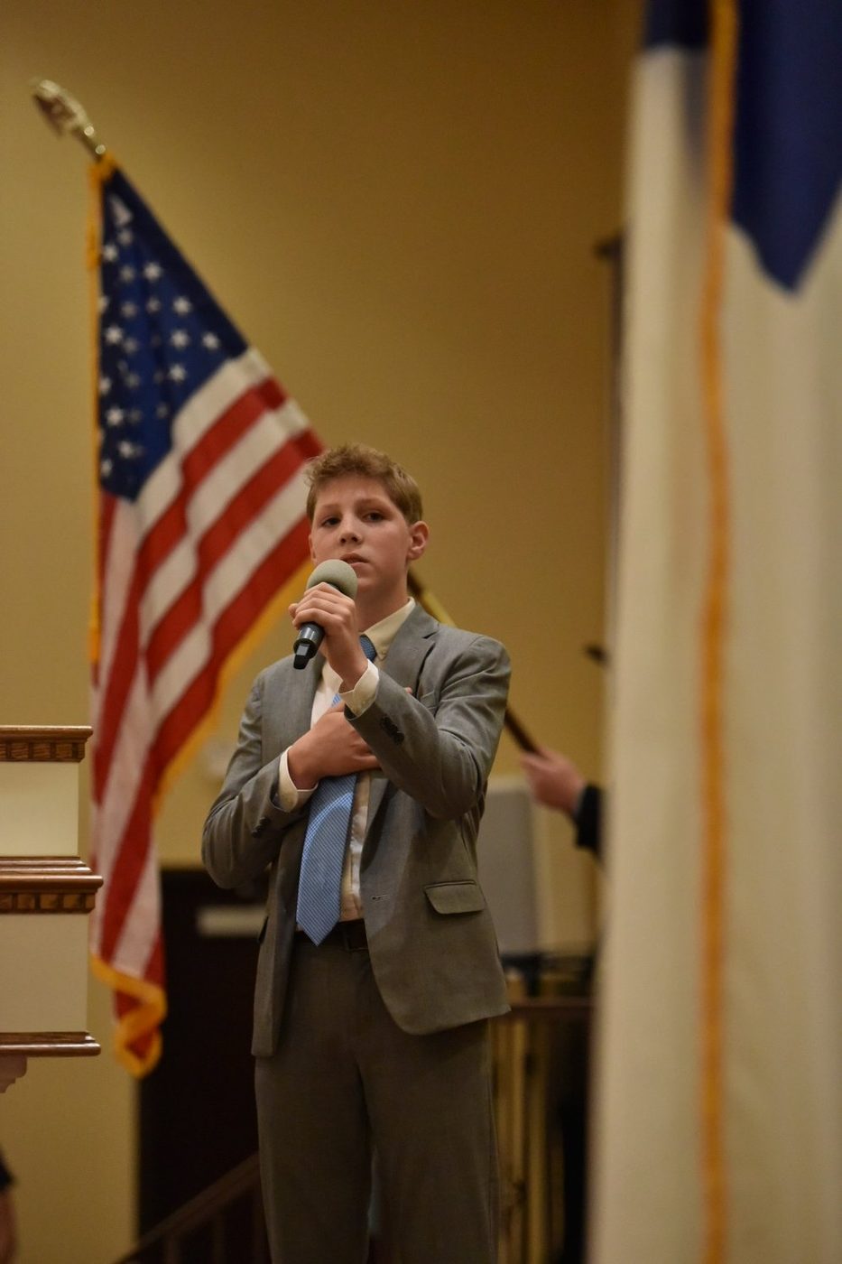 Ambassador Baptist Academy student speaking at a school event